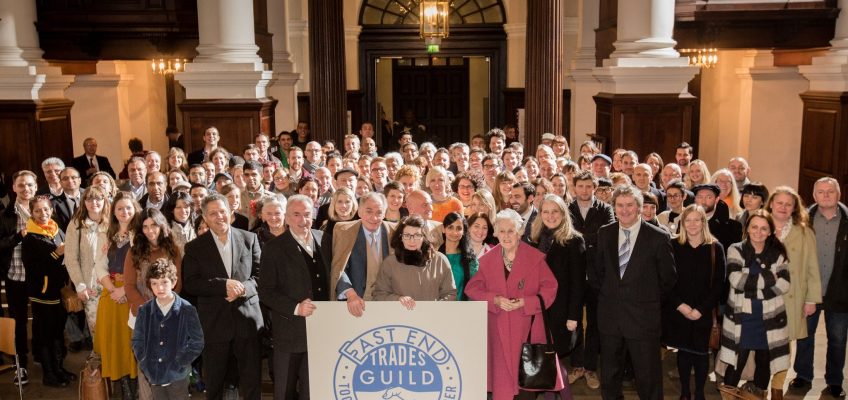 East End Trades Guild group photo with logo