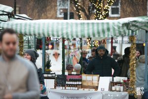 Roman Road Christmas Fair market with fairy lights in the trees