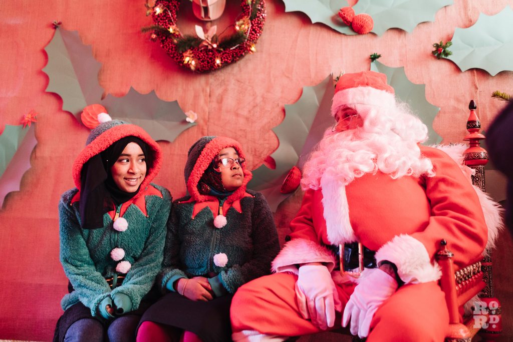 Santa's Grotto and his elves at Roman Road Christmas Fair 2016